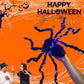 Halloween-dekoration med svart spindel och ljus